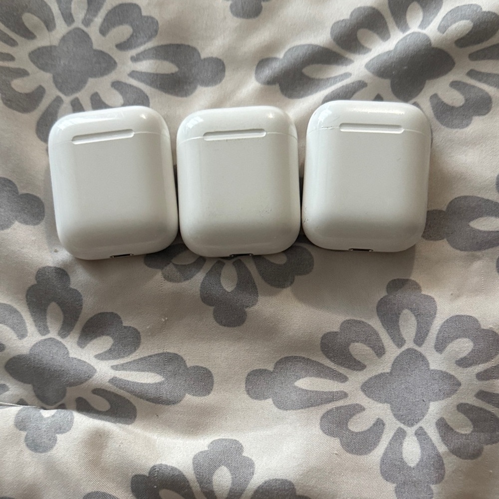 White Wireless Earbuds Charging Cases